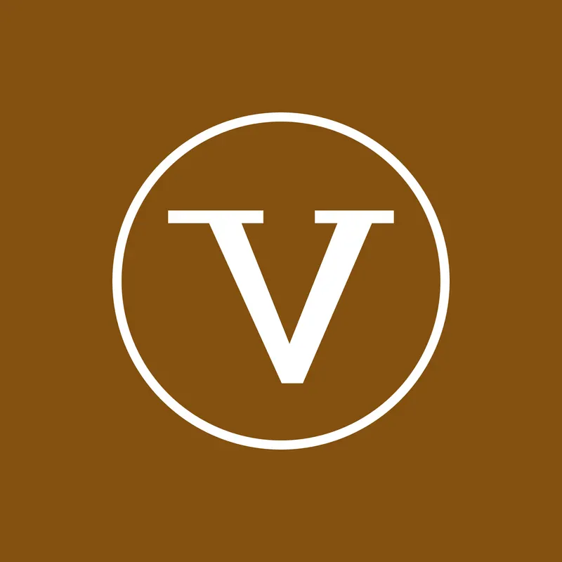 Velora-Signet: V im Kreis, weiss auf Bronze